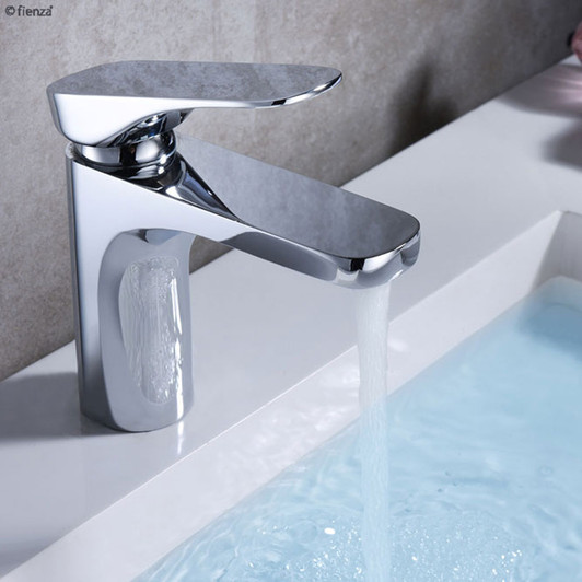 Live shot of the  Luciana Basin Mixer in Chrome. Water running into a white ceramic molded basin.