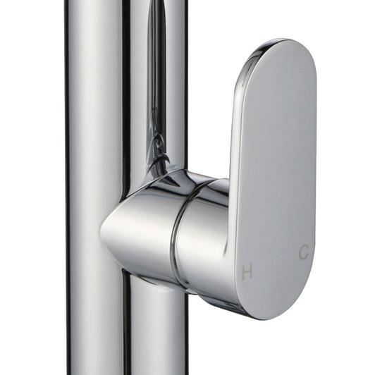 Close up of the chrome, flat oblong mixer handle.