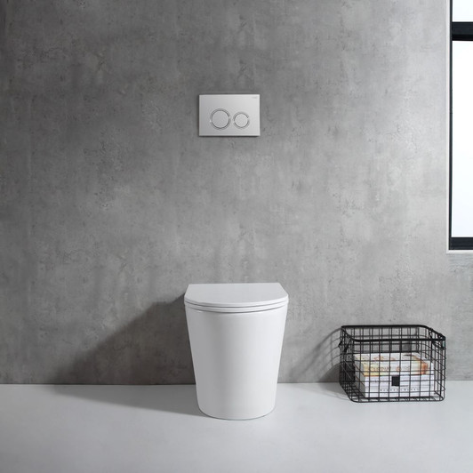 Live shot of the Java Wall Faced Rimless Pan In Wall Cistern, front on angle.