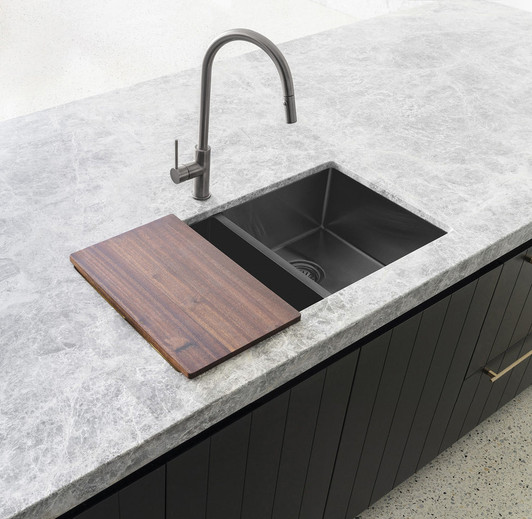 Lavello Chopping Board sitting on top of the Lavello double bowl kitchen sink.