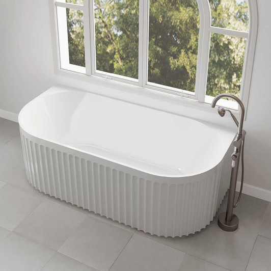 Eleanor Fluted Back-to-Wall Acrylic Bath - product image featured with the Eleanor floor mounted spout and mixer combo in brushed nickel with a white handle.