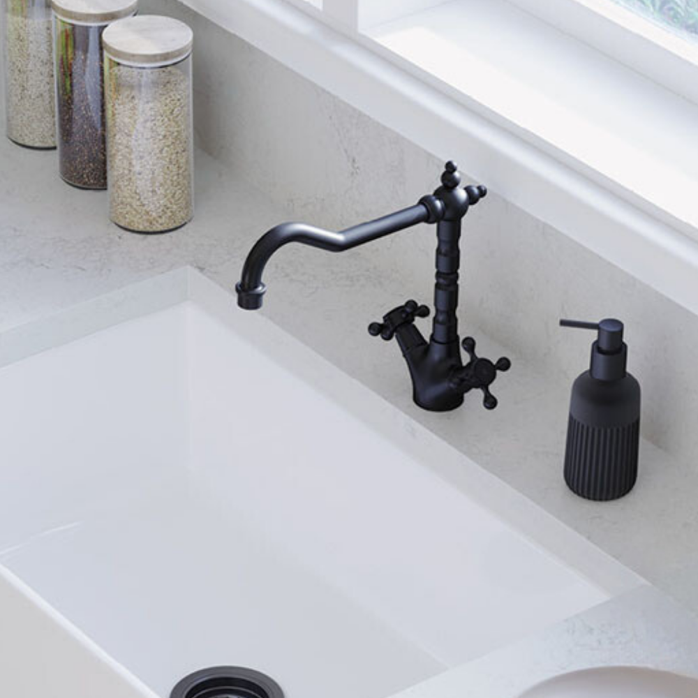 A Shepheard crook matte black sink tap set. The taps are connected to the side of the tap so only one tap hole is required.