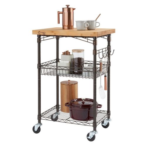 bronze kitchen cart with a pot and cups on the wood top and other kitchen accent items