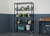 5-tier wire shelf with baskets and dividers in a garage with items on the shelves