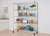 chrome shelving rack filled with kitchen items