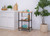 3-tier kitchen cart with bamboo top with items on its shelves in a kitchen