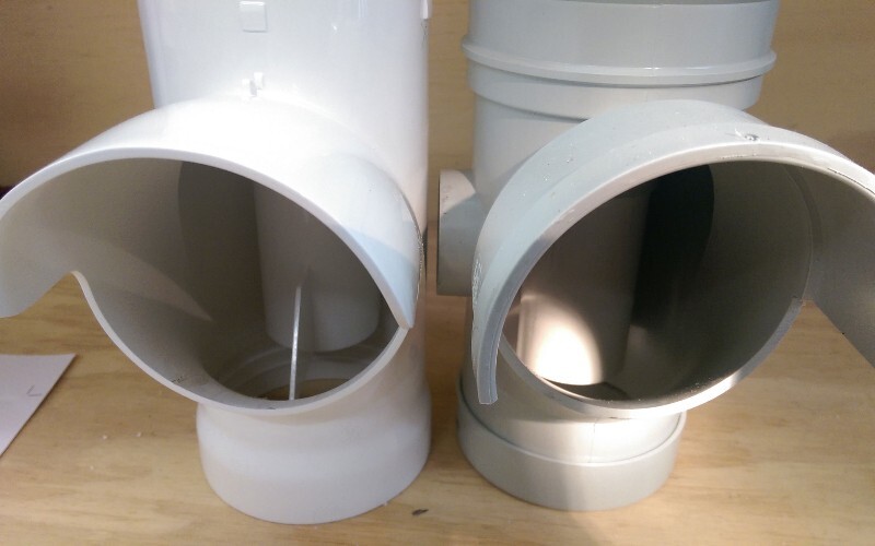 Early prototype next to the modern injection-moulded version