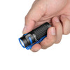 Olight Baton 4 EDC Flashlight Black (O-BATON4KIT-BK-CA) in hand