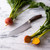 Messermeister Kawashima Chef's Knife 8" (KE-04) lying next to beets