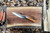 Anvil Forged Olive Chef's Knife 8" (ANCHKN01) outdoors