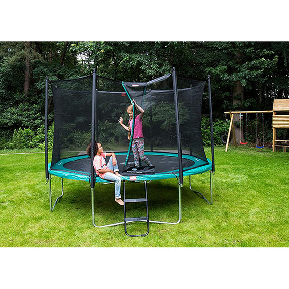 Kids playing one their BERG Favorit Green 330 + Safety Net Comfort Trampoline - Eurocycles