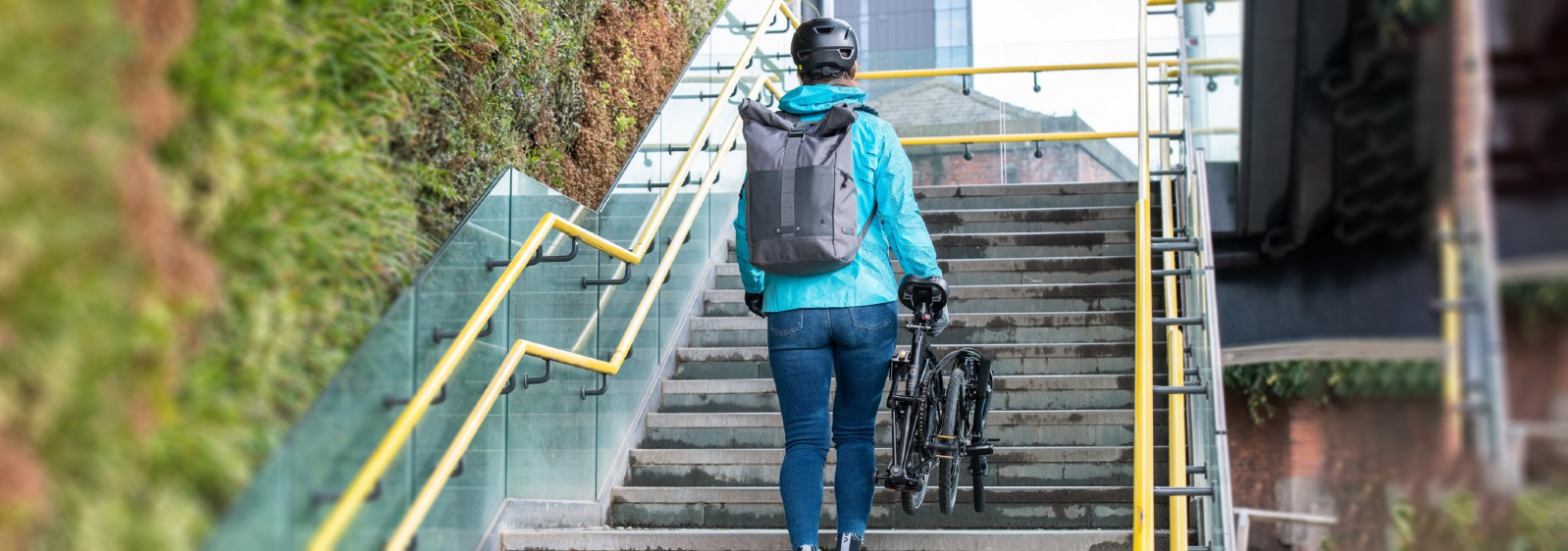 Commuter cycling into town with a backpack to carry all her essentials - Eurocycles Dublin