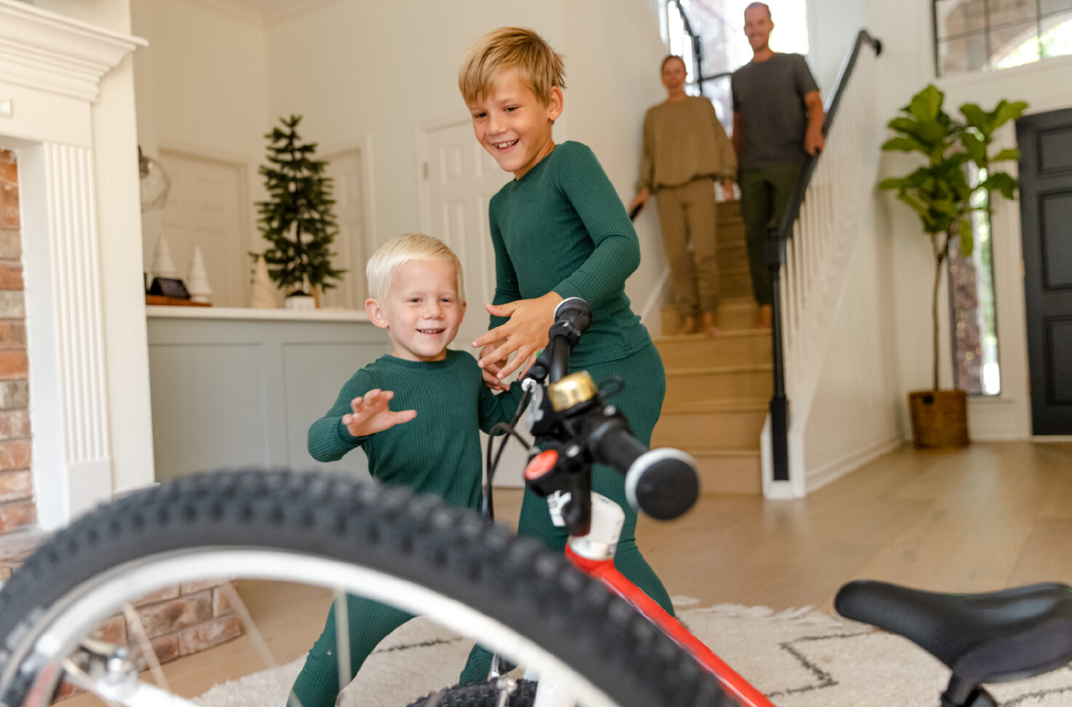 Happy kids getting a bike for Christmas - Eurocycles Ireland's number one family friendly bike shop.