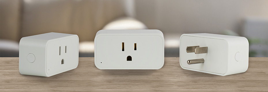 Man sitting at office desk with laptop, smart phone and Nest Mini.jpg