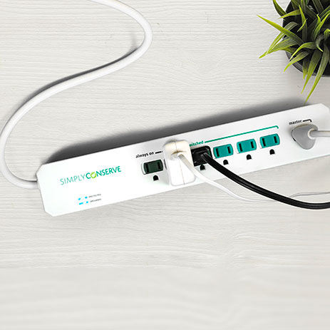 Power strip with one device plugged into the master outlet and one device plugged into the switched outlet and one device plugged into the always one outlet.