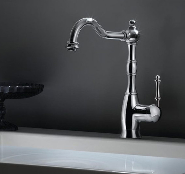 A Regal faucet that matches many traditional kitchen sink styles for sale at Houzer.