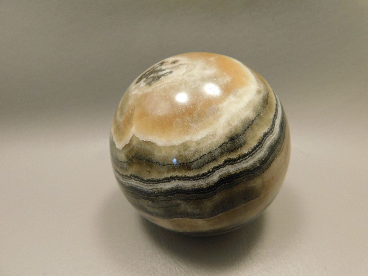 Spirit Stone 2.7 inch Rock Sphere Banded Travertine Arizona #O4