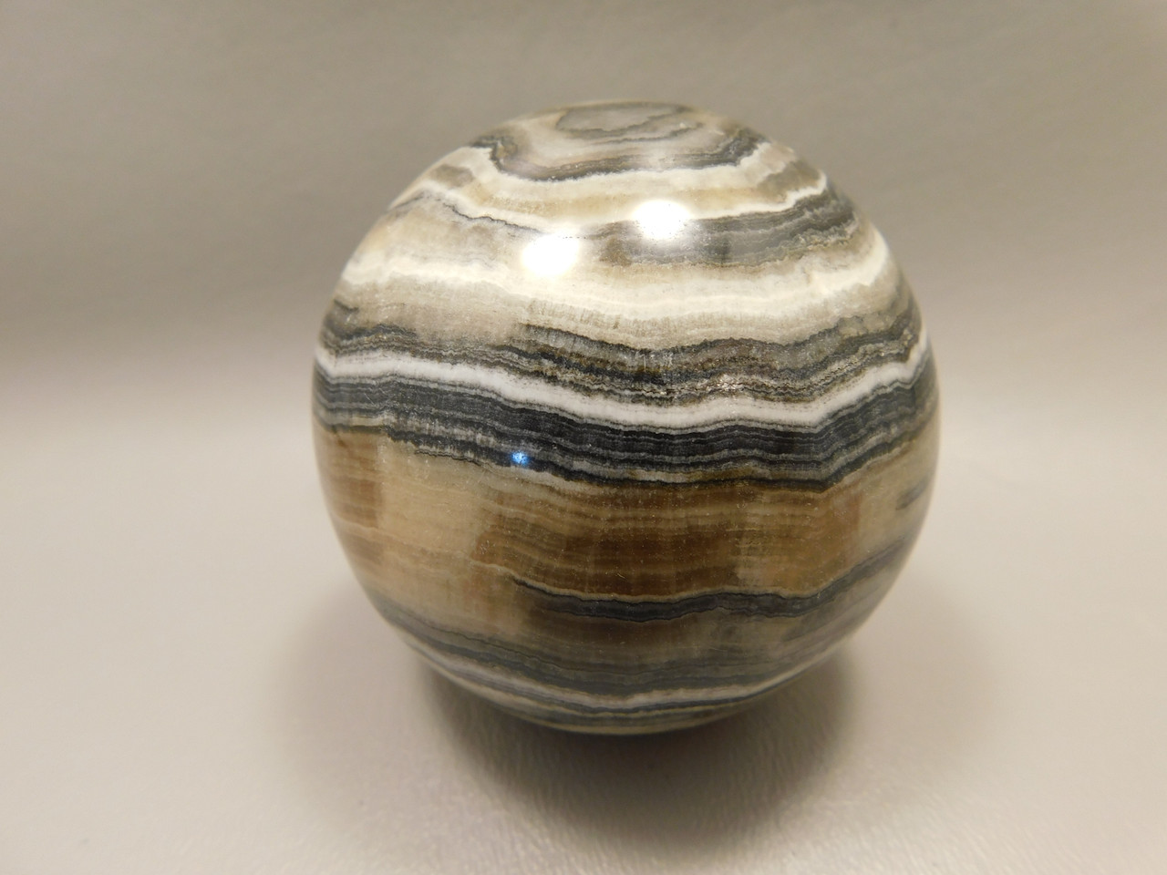 Spirit Stone 2.7 inch Rock Sphere Banded Travertine Arizona #O4