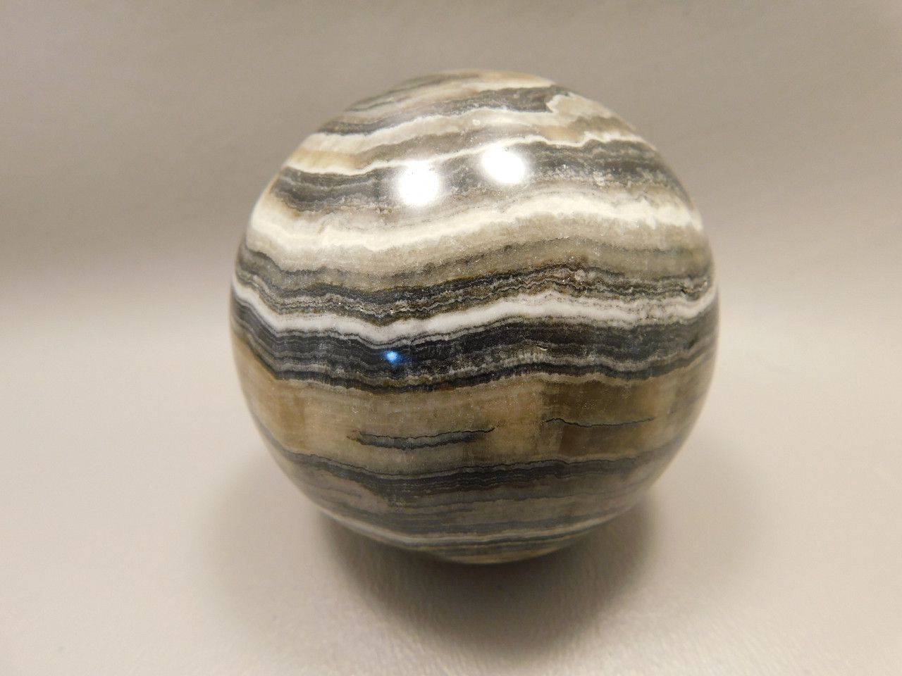 Spirit Stone 2.7 inch Rock Sphere Banded Travertine Arizona #O4