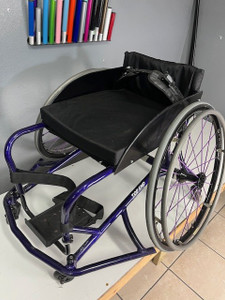 A lightly used, purple death,  PS7 basketball chair!