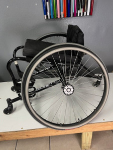 A lightly used, wet black,  T-5 7000 tennis chair!