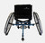Back view of the Top End SportPB pickleball wheelchair with durable aluminum frame, black nylon upholstery, 25-inch Primo Grey wheels, adjustable footrest, anti-tip, and sleek design.