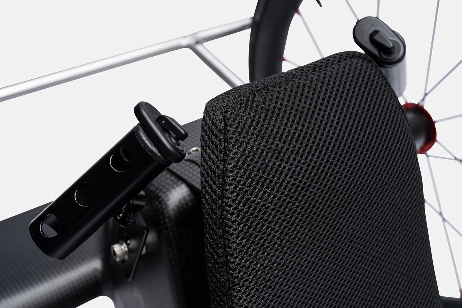 The Vento Handcylce comes with head shifters that assist quadraplegic athletes with changing gears while they ride a handcycle. The image shows the head rest and the shifters for the Vento.