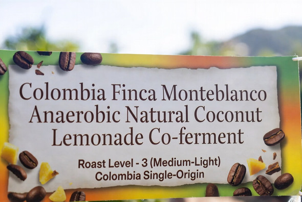 Colombia Finca Monteblanco Anaerobic Natural Coconut Lemonade Co-ferment. Bright and unique with notes of lemon, coconut, pomegranate, mandarin orange, and dark chocolate. A fun, experimental single-origin medium-light roast from Old Crown Coffee.