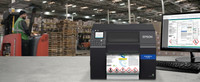 Epson ColorWorks CW-C6500P label printer in warehouse workspace