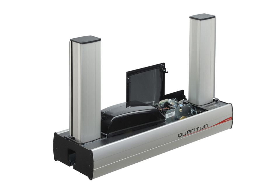 Angled view of the Evolis Quantum 2 industrial card printer showing dual vertical card hoppers and an open central section revealing internal printing components.