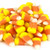 Candy corn showing in random arrangement, similar to how it appears in a candy dispensing vending machine. Candy corn showing in random arrangement, similar to how it appears in a candy dispensing vending machine.