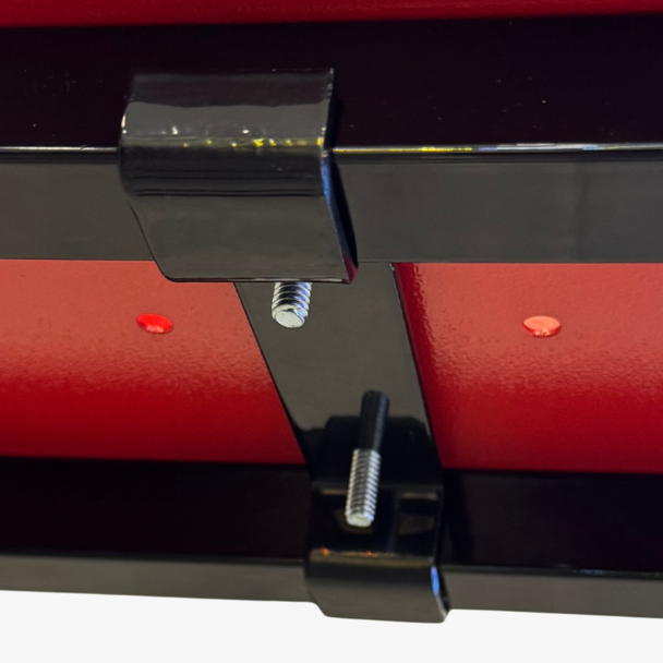 sticker machine showing the exterior attachment to the bracket