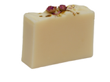 Sandalwood Rose Soap, a bouquet of velvet red roses with an oriental base of sandalwood and soft vanilla. Topped with baby rose buds.