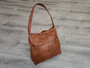 Whiskey brown leather hobo bag