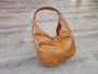 Mustard shoulder bags with thick leather