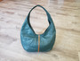 Handmade leather shoulder handbag in retro stylish style for women 