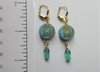 Aqua Czech glass coins with embossed cat design and tiny glass fish beads