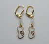 White enamel cat earrings