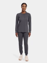 Full-length model view of Healing Hands Purple Label Women's Daisy Snap-Up Scrub Jacket 5063 in Pewter
