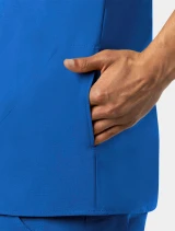 A close up view of the left side pocket on the Carhartt mens scrub top C16110 in royal