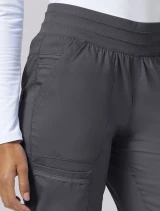Side pocket detail of Cherokee Workwear Revolution Women's Natural Rise Jogger Scrub Pant WW011 in Pewter