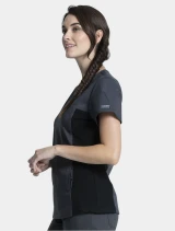 Left side view of Cherokee Workwear Revolution Women's V-Neck Knit Panel Scrub Top WW2875 in Pewter