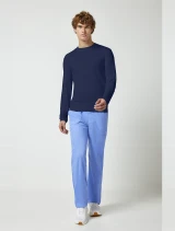 Full-length model view of Cherokee Workwear Professionals Men's Underscrub Knit Top #WW700 in Navy