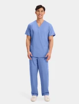 Full-length model view of Cherokee Workwear Originals Unisex 3 Pocket V-Neck Scrub Top 4876 in Ciel