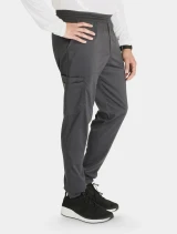 Right side view of Cherokee Workwear Revolution Men's Mid Rise Drawstring Cargo Jogger Scrub Pant WW251 in Pewter