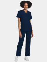 Women's full-length model view of Cherokee Workwear Originals Ultra Unisex 1 Pocket V-Neck Scrub Top CK778A in Navy