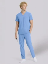 Full-length model view of Cherokee Workwear Originals Ultra Unisex 1 Pocket V-Neck Scrub Top CK778A in Ciel