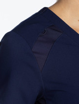 Bungee loop view of the Spirt Scrubs women's V-Neck top PWT111 in navy.