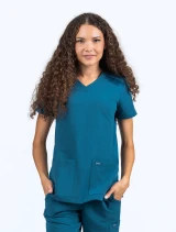 female nurse wearing the spirit scrubs v-neck scrub top uot111 in caribbean