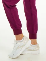 Leg cuff view of the Spirit Scrubs women's jogger scrub pant #UOB407 in wine